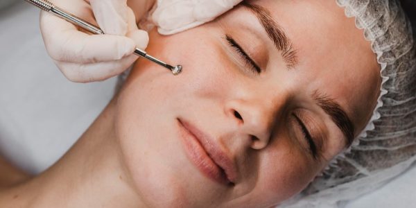 woman-getting-skincare-procedure-wellness-center (1)